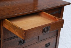 Upper center drawer extended to show original "ooze leather".